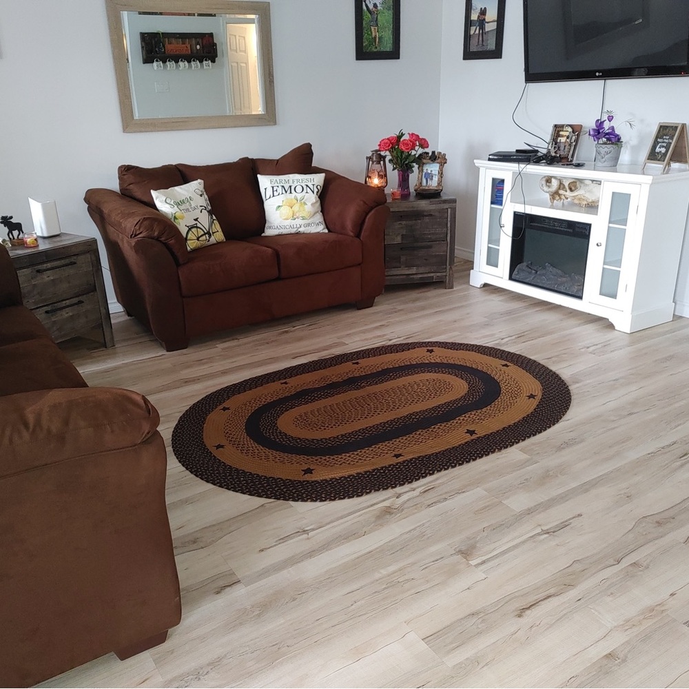 Large primitive area rug.